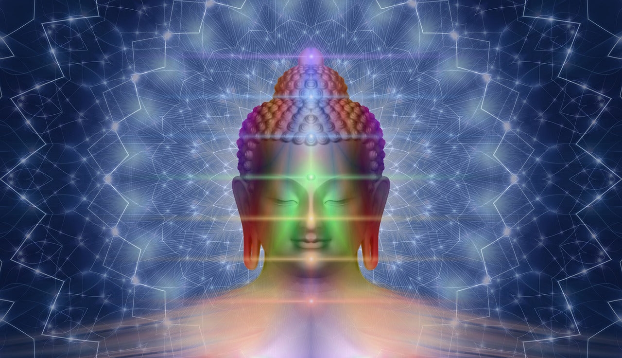 The Power of Chakra Affirmation with the head of a Buddha sending out positive affirmation