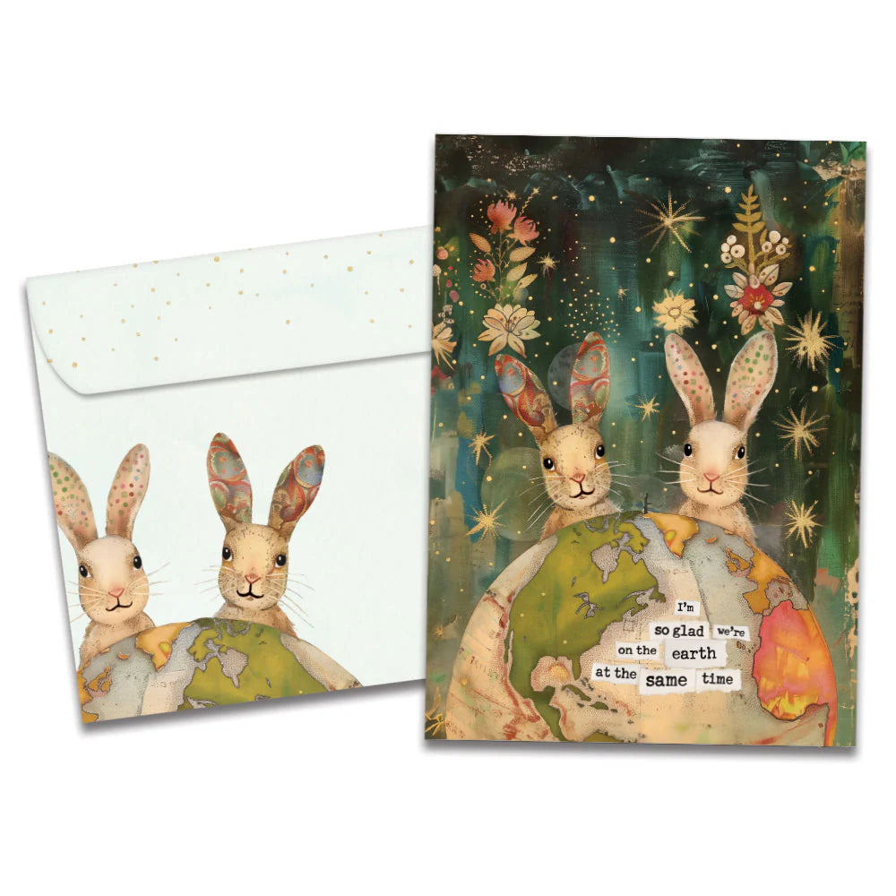 Earth rabbits card image of rabbits behind the earth with flowers surrounding them 