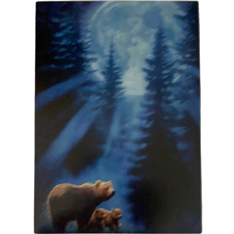 Two bear cubs walking with their mother in a forest under a bright full moon.