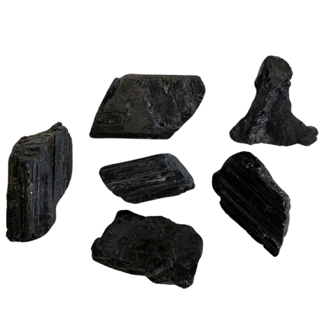 Black Tourmaline Raw md - Group of black tourmaline crystals, radiating energy for negativity deflection and spiritual cleansing.