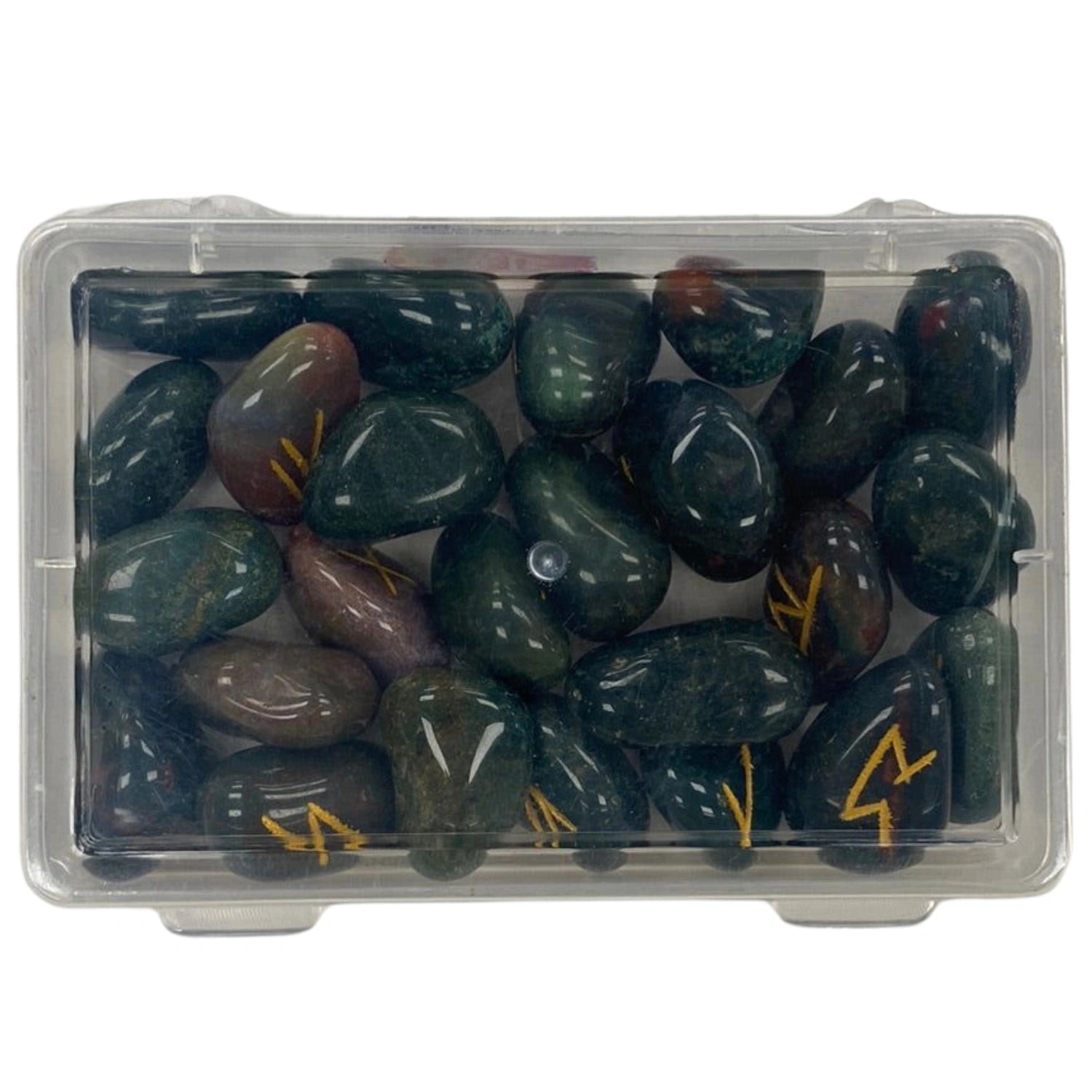 Clear plastic box filled with green jasper stones with gold runes engraved on them.