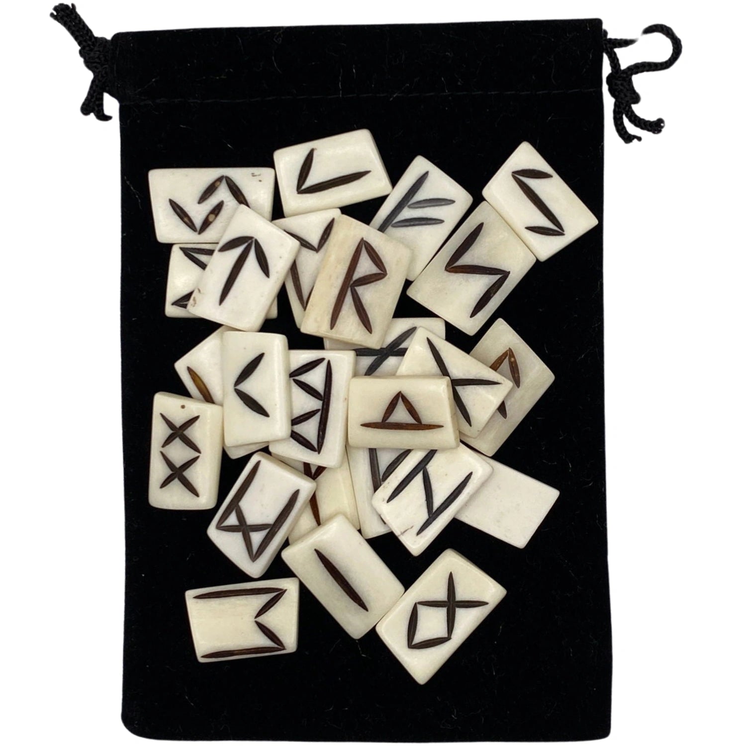 Black velvet pouch containing bone runes with gold runes engraved on them.