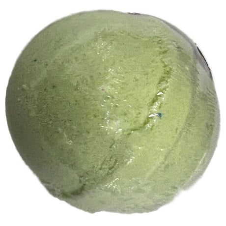 Green bath bomb with white swirls and a smooth, rounded surface.