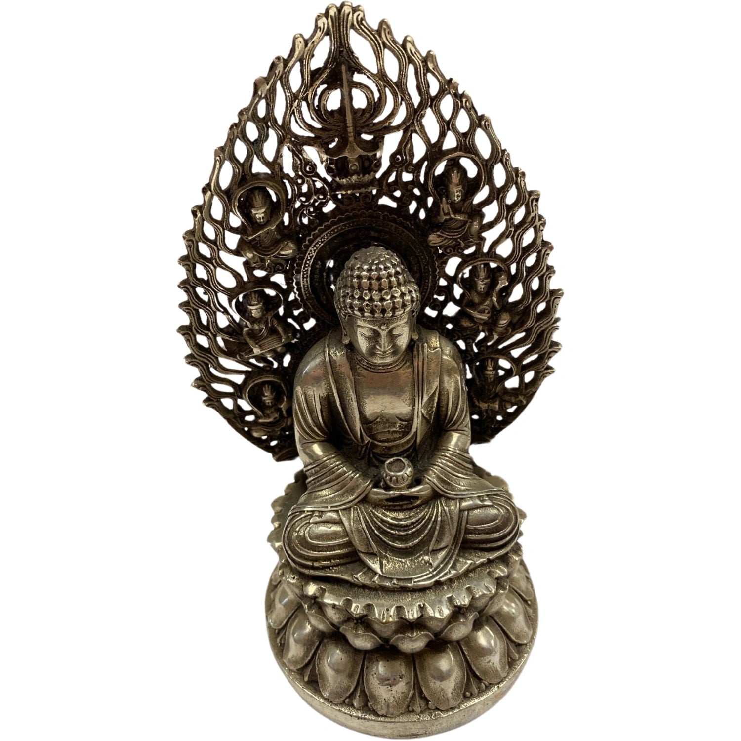 Seated Buddha statue with intricate detailing and a halo, surrounded by smaller figures.