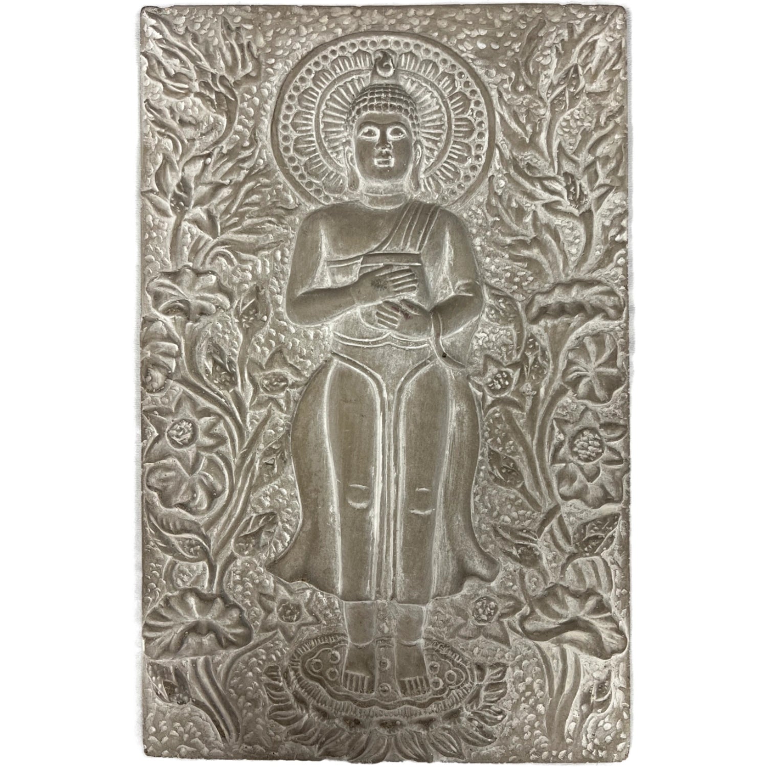 Gray stone wall plaque with a carved Buddha figure surrounded by floral designs.