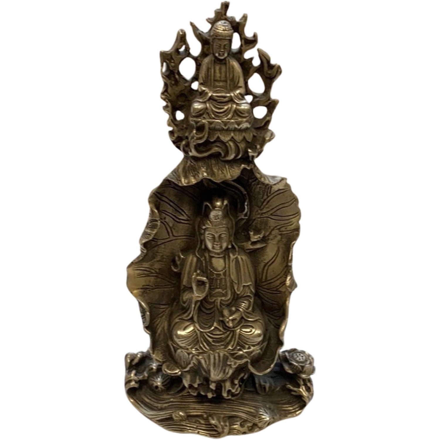 Brass statue featuring Guanyin seated on a lotus base, surrounded by a lotus leaf. Above her is a smaller Buddha figure seated on a lotus platform.