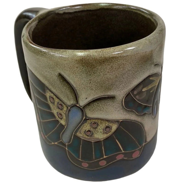 Stoneware mug with butterfly design.