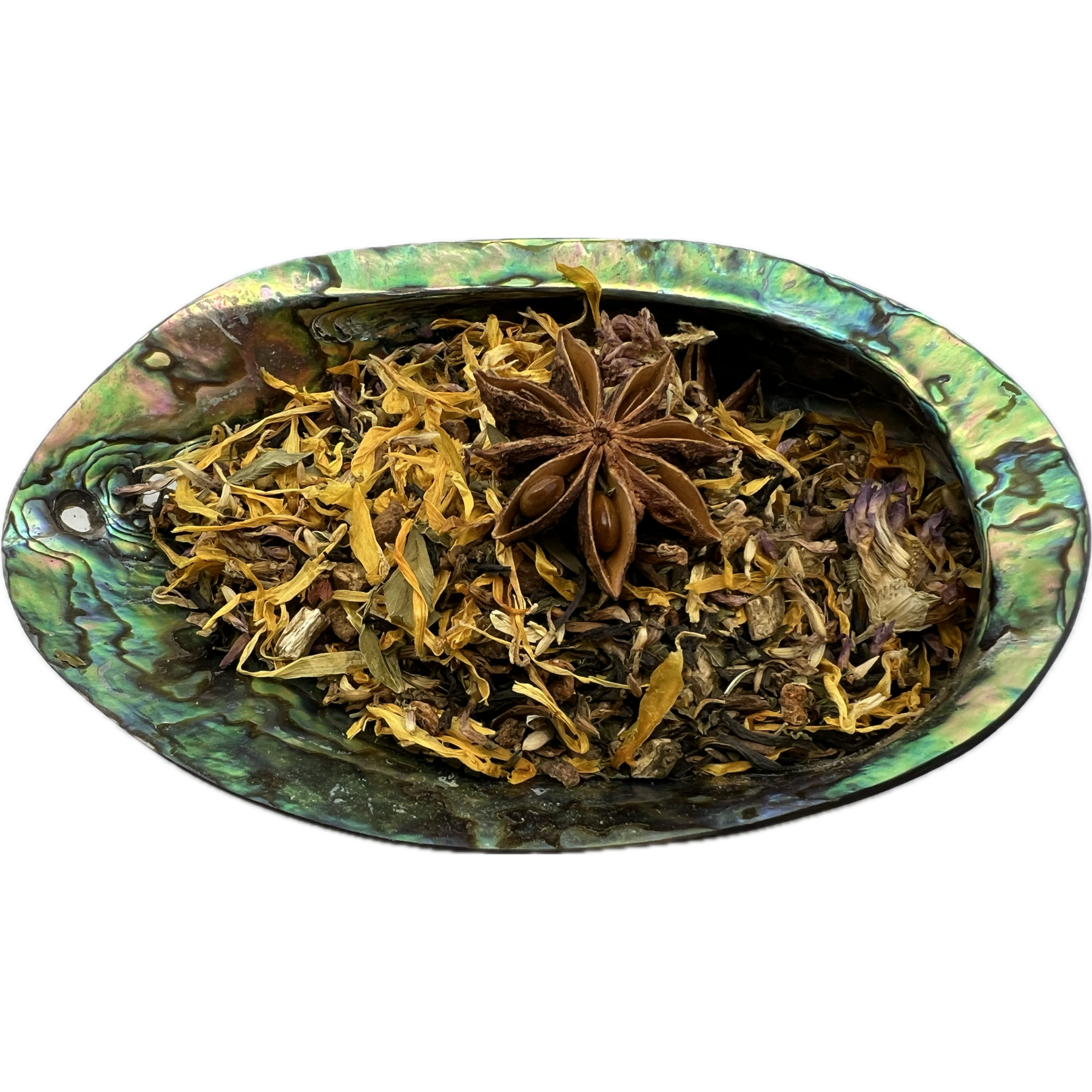 Dried mixed herbs called Dark Days Tea placed on a colorful shell bowl