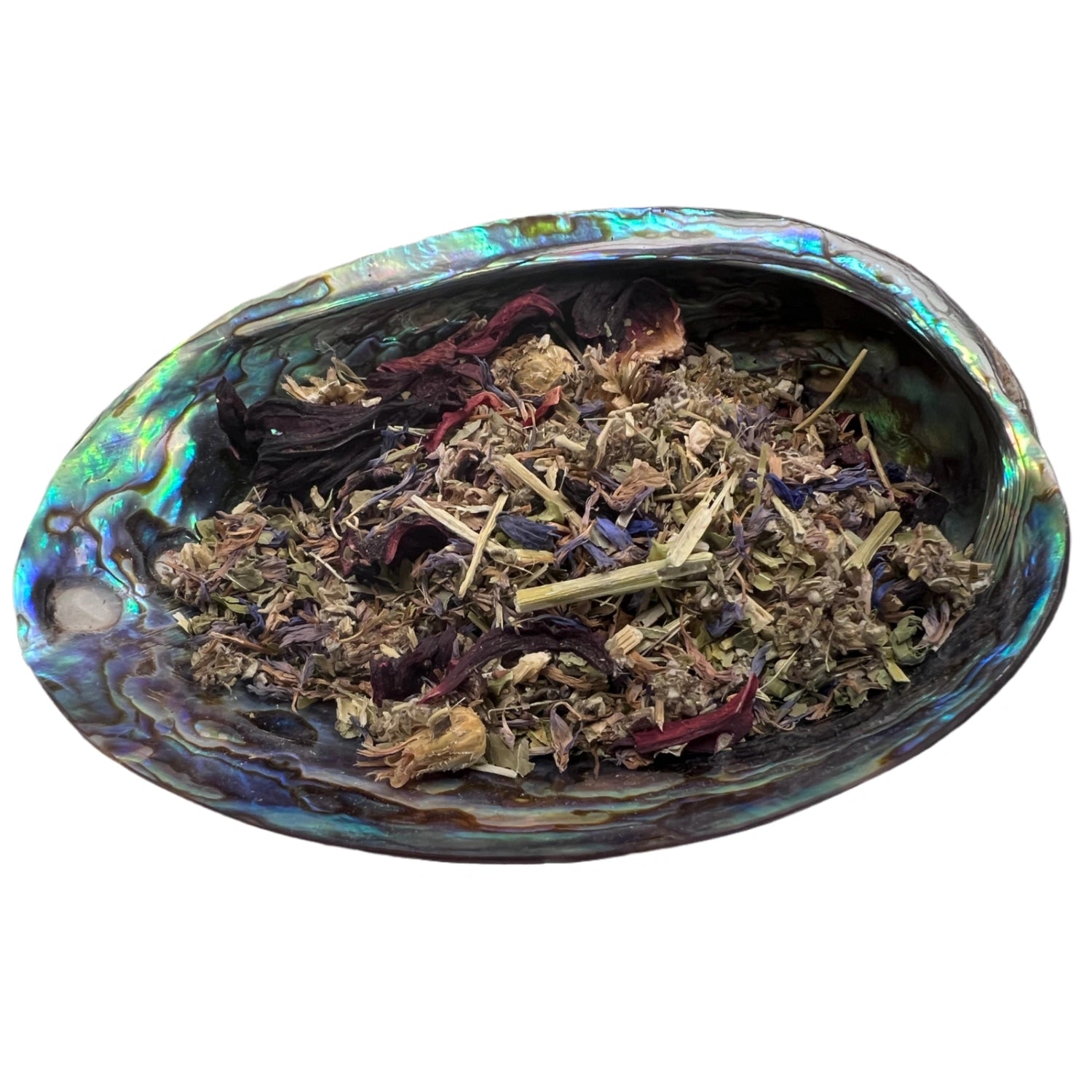 Dried Dream Blend Tea herbs in an abalone shell.