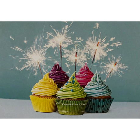 Greeting card with four colorful cupcakes topped with sparklers.