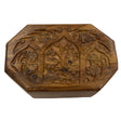 Wooden box with intricate floral carvings.