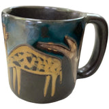 Stoneware mug with giraffe design.