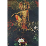 A golden statue of a woman seated on a rock, surrounded by flowers and a lotus pond.