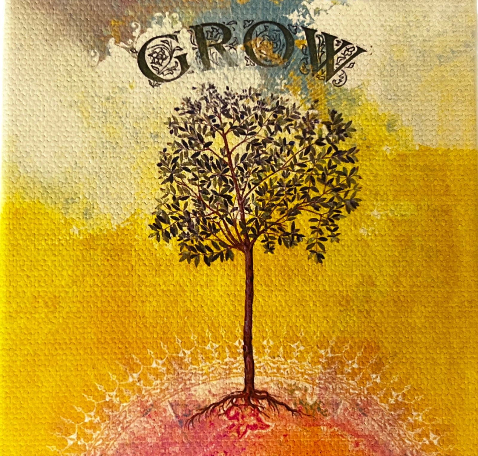 A canvas magnet with the word "GROW" in bold, handwritten letters. Below the word, a small tree with green leaves stands on a yellow background. The tree's roots are visible, and a mandala pattern surrounds them. The background is a mix of yellow, orange, and pink hues, with soft brushstrokes creating a textured effect.