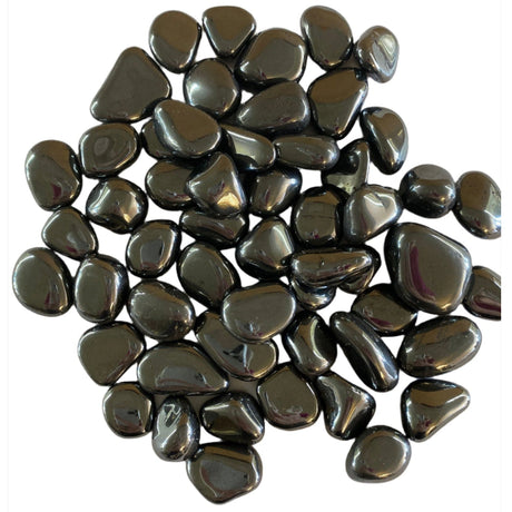 Tumbled Hematite stones with a smooth, polished finish and a dark gray, metallic luster.