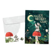 Magical wishes birthday  green card with image of rabbit sitting on a red mushroom 