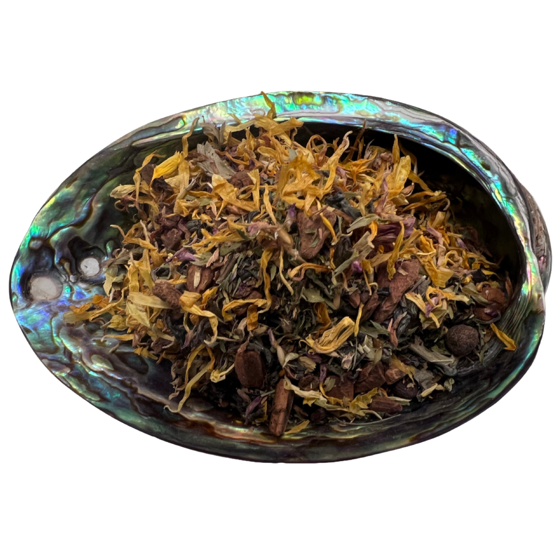 Dried mixed herbs named Manifestation Blend Tea placed on a colorful shell bowl