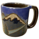 Stoneware mug with mountain design.