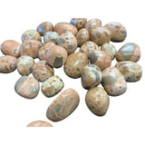 Rhyolite Jasper Tumbled - Polished stones with creamy, brown, and gray colors.