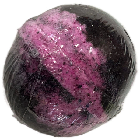 Purple and black bath bomb wrapped in plastic.