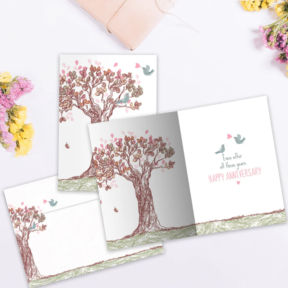 Inside card with tree and first with message of happy anniversary 