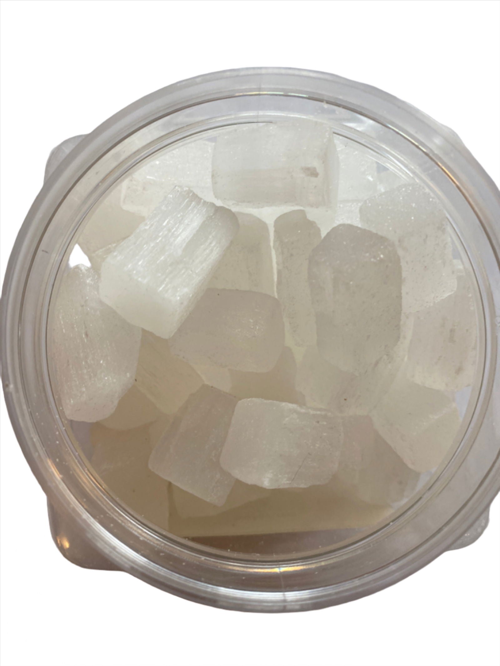 Selenite Tumbled - Translucent white stones with smooth surfaces.