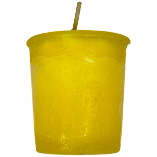 Yellow votive candle with a smooth, unadorned surface.