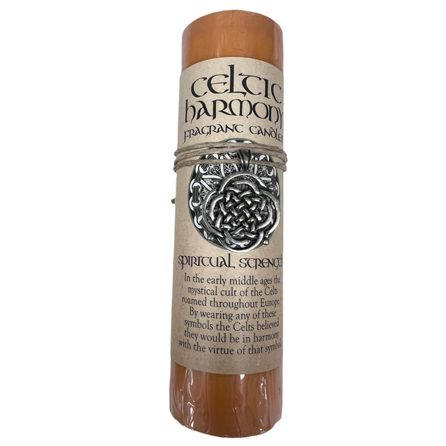 Spiritual Strength Celtic Pendant Candle - Pillar candle yellow orange in color with a Celtic pendant and beige label 