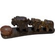 Stone elephant incense burner with a circular incense holder.