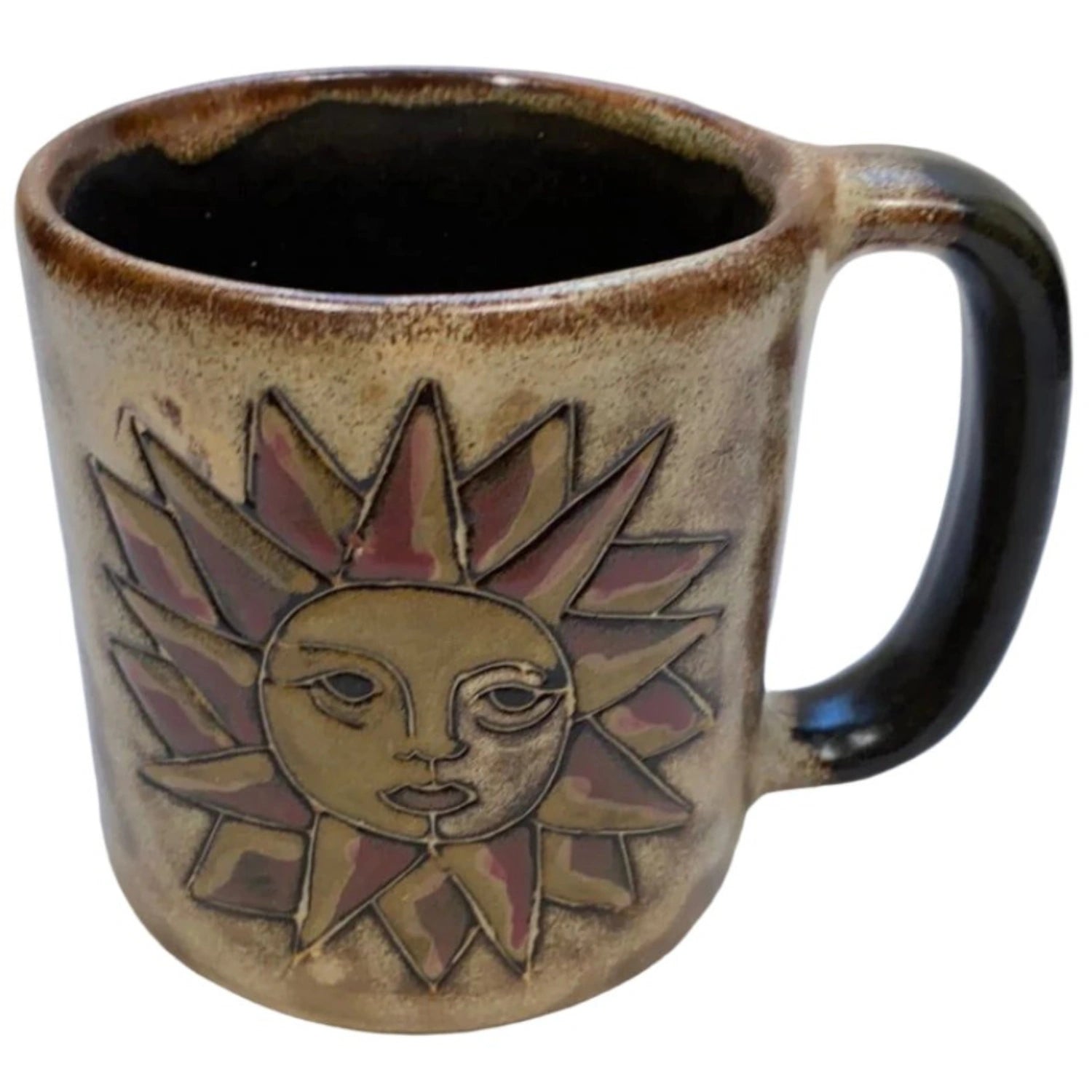 Stoneware mug with a sun design.