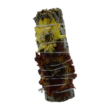 White Sage smudge stick with dried flower petals.